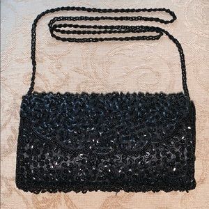 Elegant black beaded and sequined evening bag.